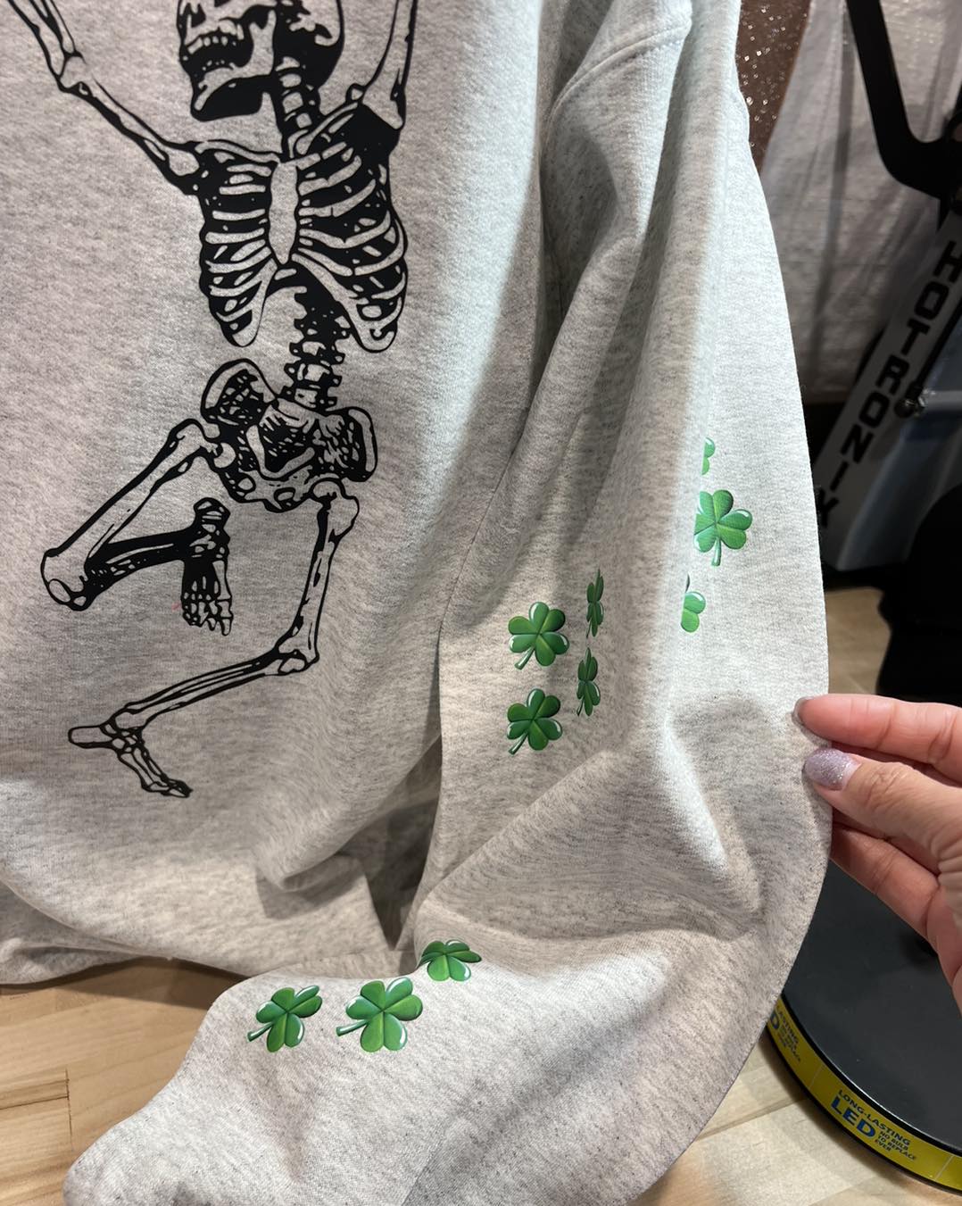 SKELETON WITH CLOVERS DANCING ALL OVER