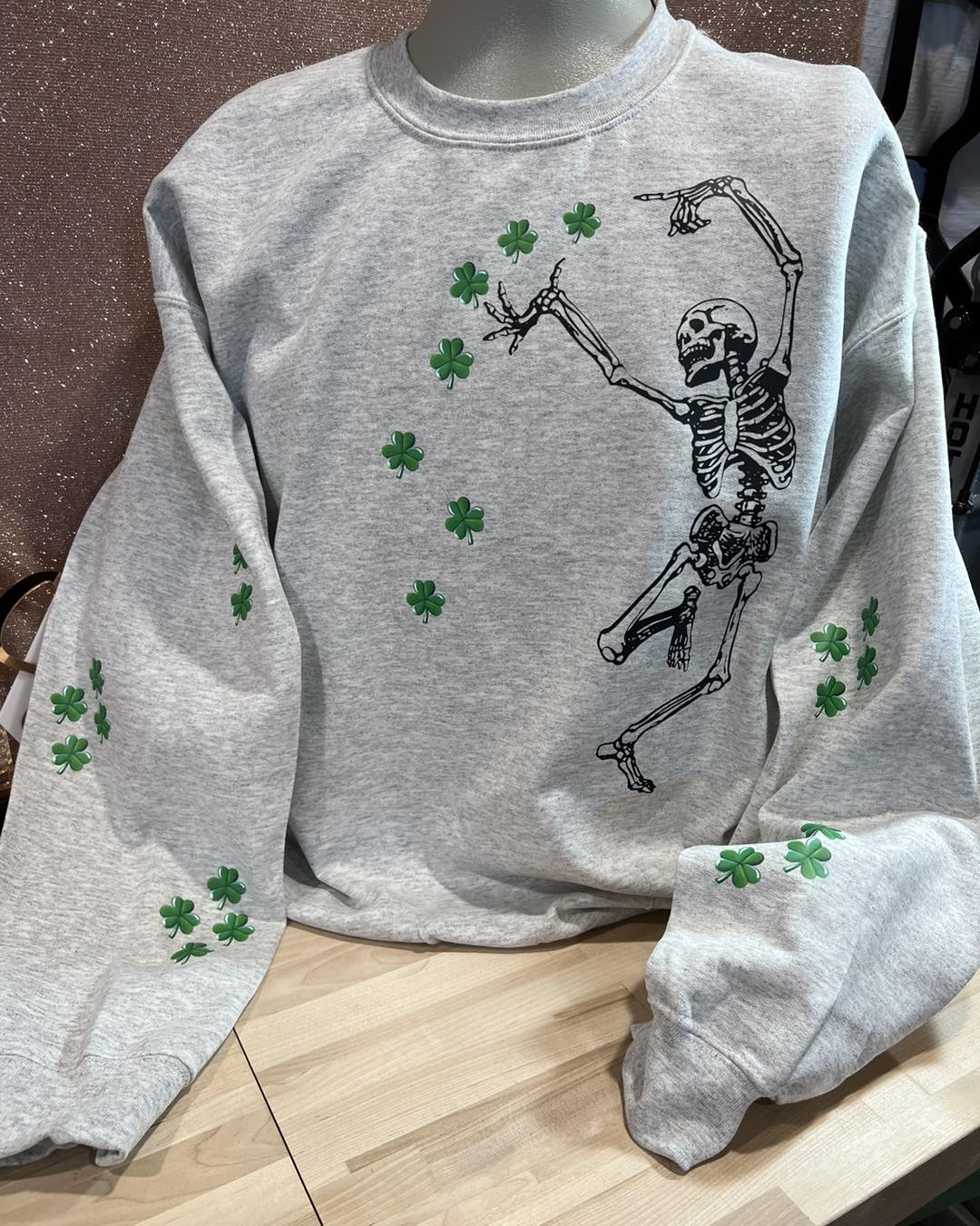 SKELETON WITH CLOVERS DANCING ALL OVER