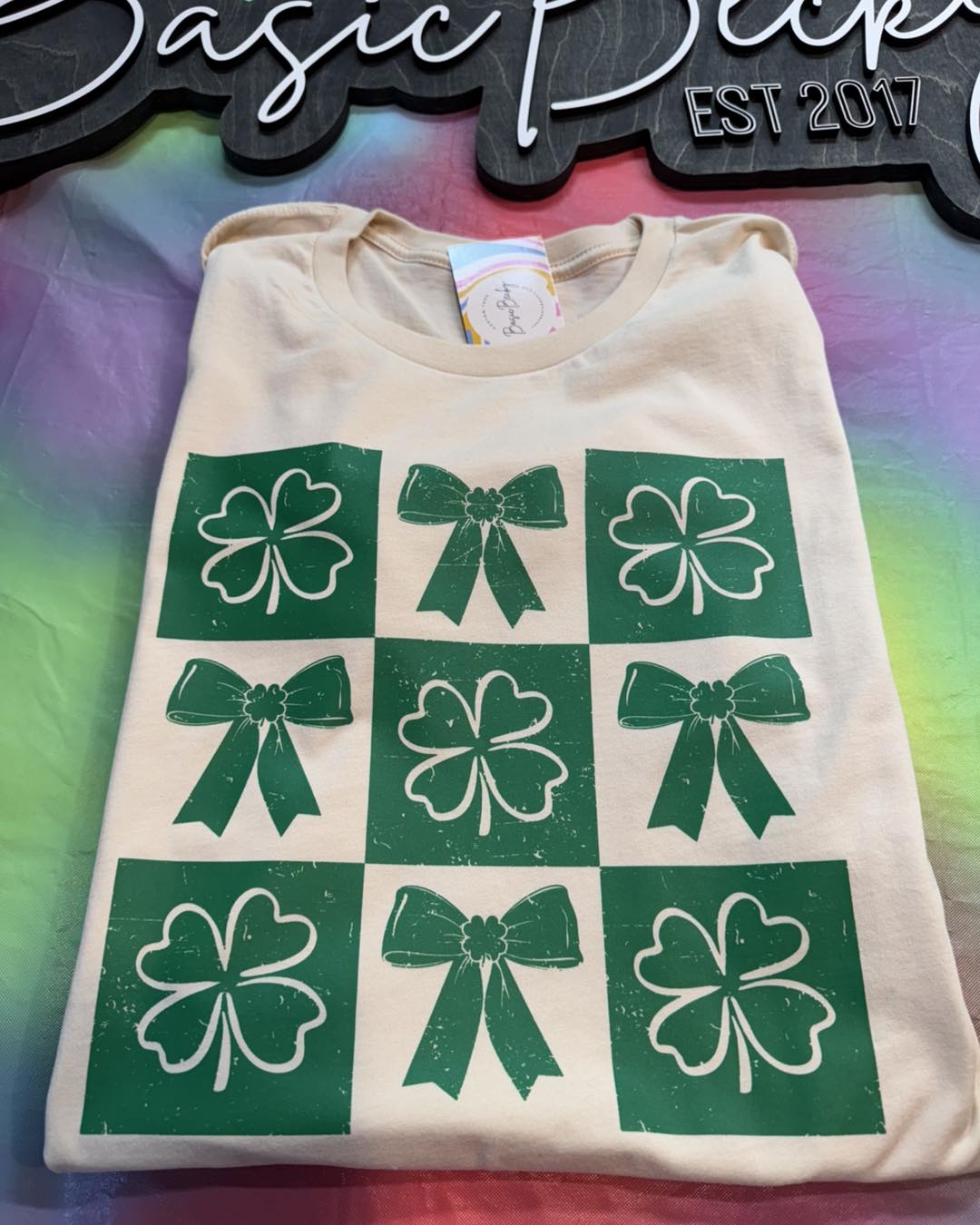 GREEN BOX OF SHAMROCKS AND BOWS ON SAND