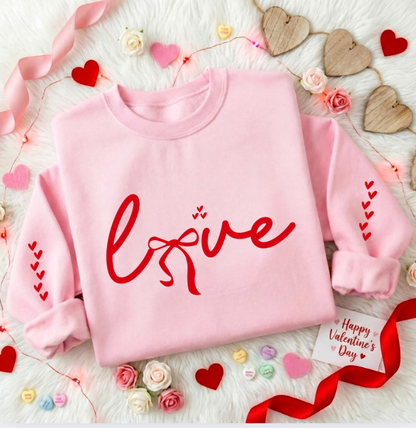 LOVE WITH BOWS AND HEARTS ON SLEEVES